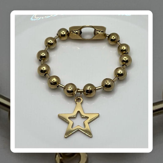 Pulsera estrella color oro