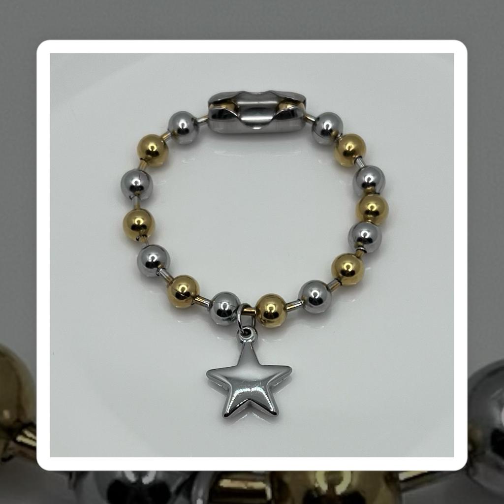 Pulsera estrella doble tono